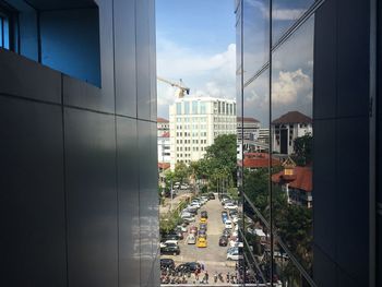 Buildings in city against sky