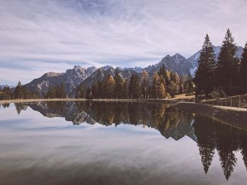 Scenic view of lake with mountains in background