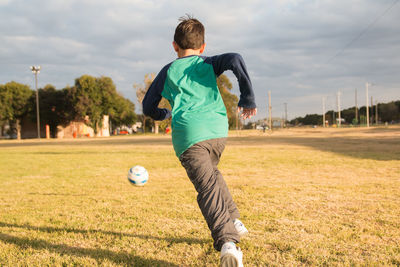 Boy playing soccer