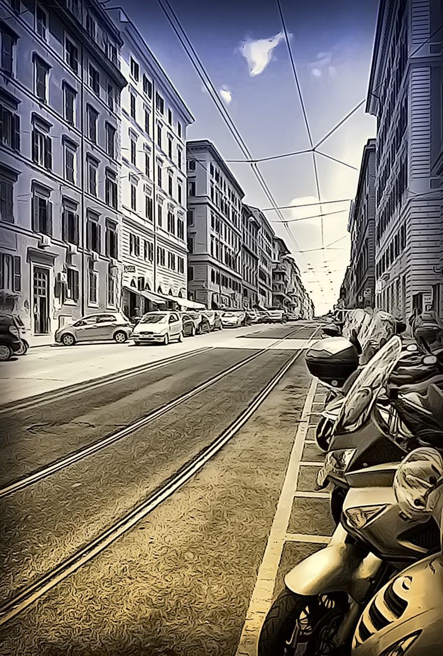 building exterior, architecture, railroad track, built structure, transportation, sky, rail transportation, city, the way forward, diminishing perspective, railroad station, power line, vanishing point, public transportation, men, city life, railroad station platform, cable