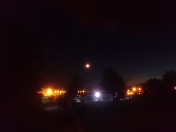 Illuminated street light at night