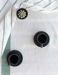 High angle view of coffee cup on table