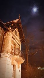 Low angle view of building against sky at night