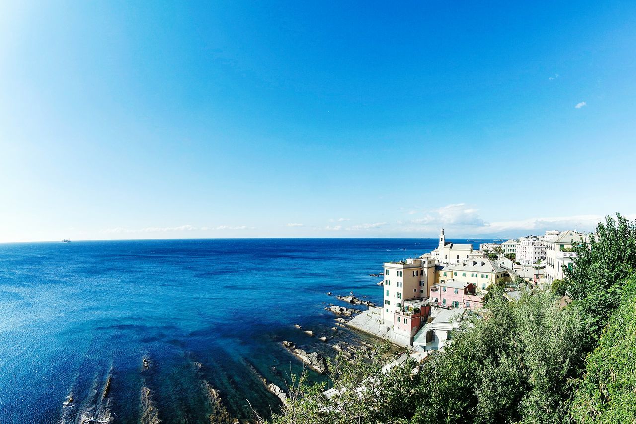 HIGH ANGLE VIEW OF CALM SEA AGAINST CLEAR SKY