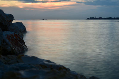 Scenic view of sea against sky during sunset