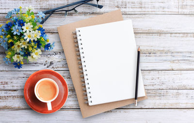 High angle view of coffee cup on table