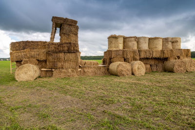 Tractor from straw bales in the field