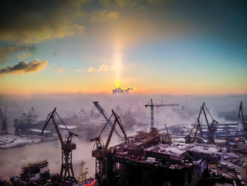 Aerial view of commercial dock during sunset