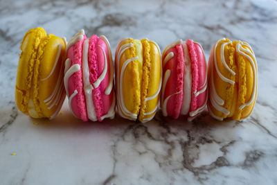 High angle view of multi colored candies on table