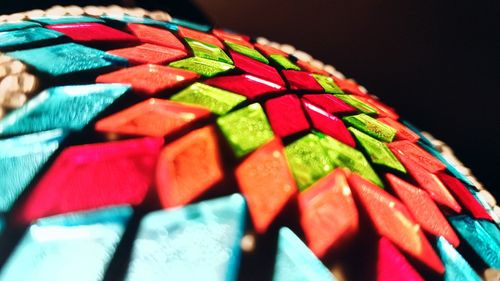 Close-up of multi colored candies on table