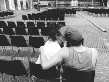 Rear view of couple standing outdoors