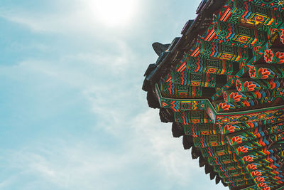 Low angle view of ornate building against sky