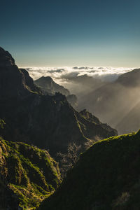 Sunrays falling through the peaks surrounding the curral das freiras, the nuns valley in madeira