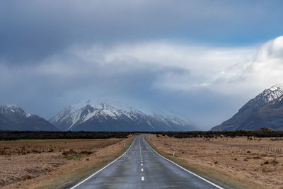 Scenic view along the mount cook road alongside with snow capped southern alps and majestic mt cook.