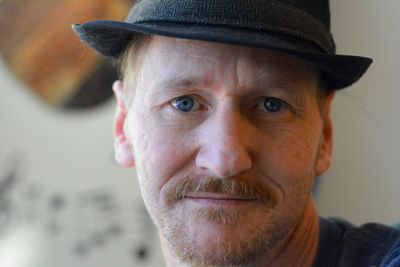 Portrait of mature man wearing hat