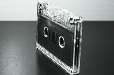 Close-up of telephone booth on table