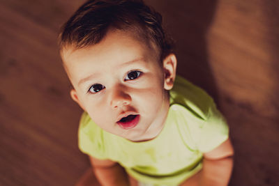 Portrait of cute baby girl at home