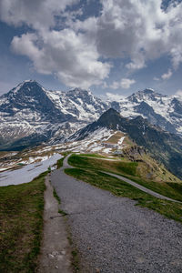 Scenic view of snowcapped mountains against sky