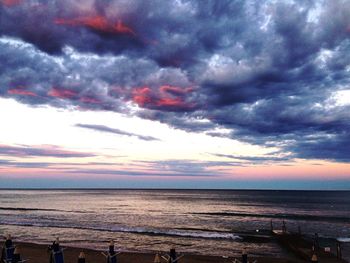 Scenic view of sea against cloudy sky