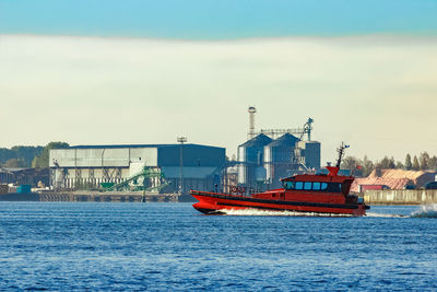 Ship in sea against sky