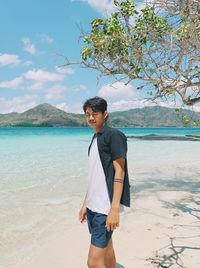 Full length of man standing at beach