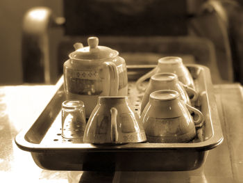 Close-up of wine bottles on table