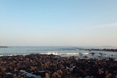 Scenic view of sea against clear sky