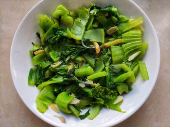 High angle view of chopped vegetables in bowl on table