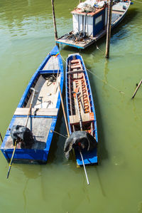 High angle view of fishing boat moored in lake