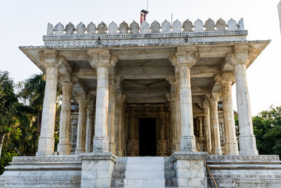 Ancient unique temple architecture with bright blue sky at day from different angle
