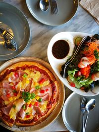 High angle view of food served on table