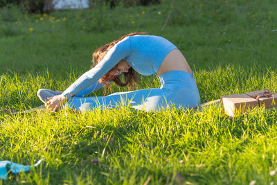 Woman lying in field
