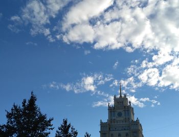 Low angle view of bell tower against sky