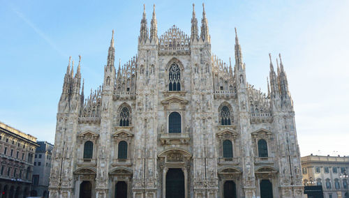 Low angle view of milan cathedral against clear sky