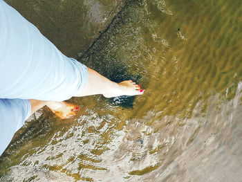 Low section of person in lake
