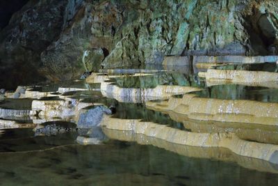 Scenic shot of rock formations in water