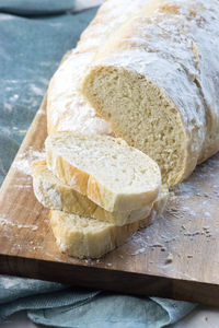 High angle view of bread on cutting board