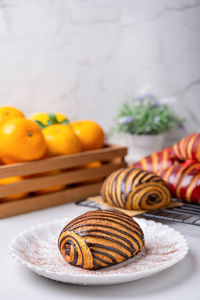 Close-up of fruits in plate on table