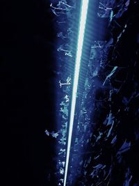 Illuminated water at night