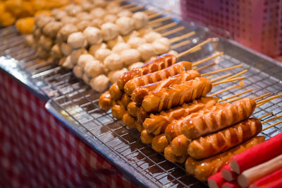 High angle view of meat on barbecue grill