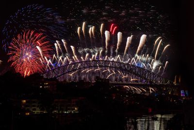 Firework display at night