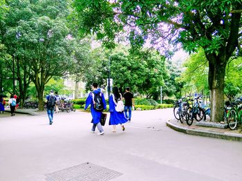 Rear view of woman standing in park