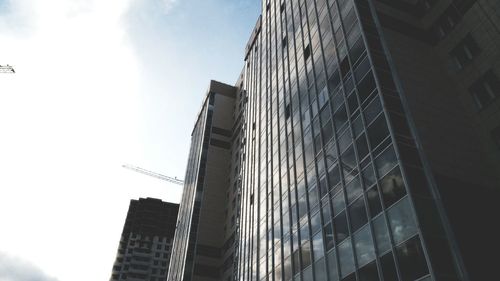 Low angle view of skyscraper against sky