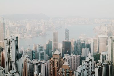 High angle view of buildings in city against sky