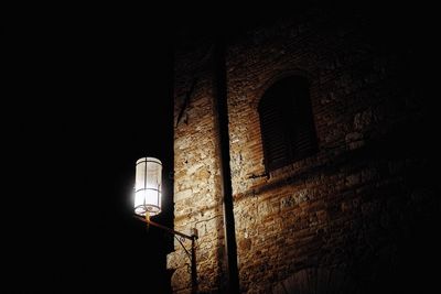 Low angle view of illuminated building at night