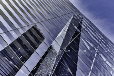 Low angle view of modern building against sky