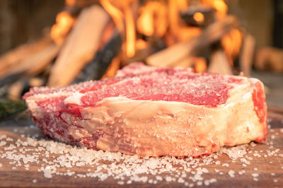 Italian steak ready to be cooked on a barbecue. appetizing piece of meat ready to be set on bbq fire