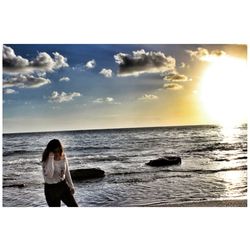 Woman standing on beach