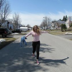 Full length of woman on road against sky