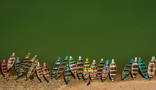 Fishing boat many at river shore at morning from flat angle